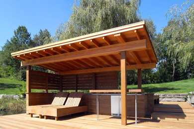 Dock - large contemporary backyard dock idea in Other