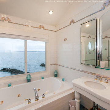 New White Sliding Window in Stunning Bathroom - Renewal by Andersen Long Island