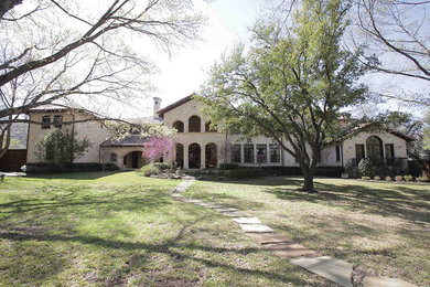 Inspiration for a mediterranean exterior home remodel in Dallas