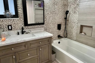 Mid-sized master single-sink shower curtain photo in Orlando with a one-piece toilet, an undermount sink and a freestanding vanity