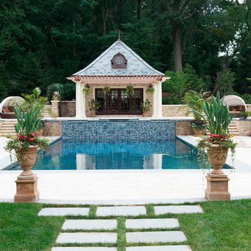 Traditional Pool with Spillover Spa and Poolhouse