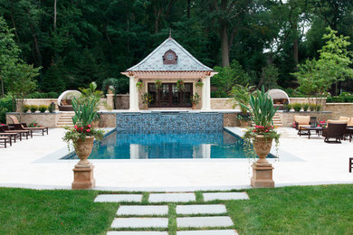 This is an example of a mid-sized contemporary backyard rectangular lap pool in New York with a pool house and concrete slab.