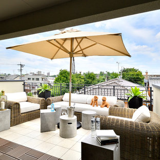 東京23区のモダンスタイルのおしゃれなデッキ (オーニング・日よけ) の写真