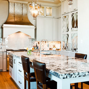 Mirrored Kitchen Cabinetry with Metal Hood St. Louis, MO