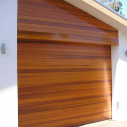 Horizontal western red cedar tilt garage door with matching panels - Garage Doors & Openers