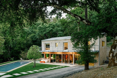 Contemporary beige two-story exterior home idea in San Francisco