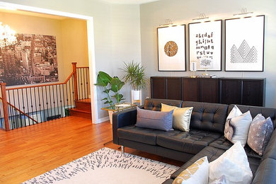 Mid-sized 1950s light wood floor living room photo in Toronto with gray walls