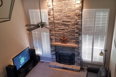 Mountain style living room photo in Detroit