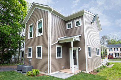 Victorian concrete fiberboard and clapboard exterior home idea in Philadelphia with a shingle roof
