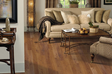 Living room - mid-sized traditional open concept medium tone wood floor living room idea in Salt Lake City with beige walls, no fireplace and no tv