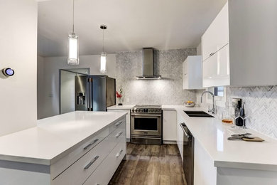 Mid-sized minimalist l-shaped medium tone wood floor and brown floor open concept kitchen photo in Toronto with a double-bowl sink, flat-panel cabinets, white cabinets, quartz countertops, gray backsplash, porcelain backsplash, stainless steel appliances, an island and white countertops