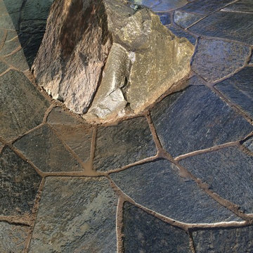 Chocolate Charcoal Quartzite Flagstone Patio with Basalt Column Fountain