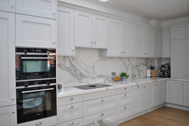 This is an example of a contemporary kitchen in London.