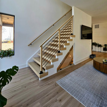 Project #111 | Open-Riser Staircase with Glass Panel Detail