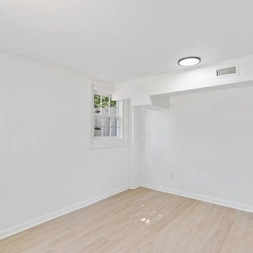 Garage Conversion in Belmont with Updated Utilities and Interior Systems