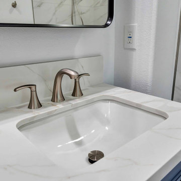 Irvine Bathroom Remodel with Quartz-Style Countertop with Brushed Nickel Fixture