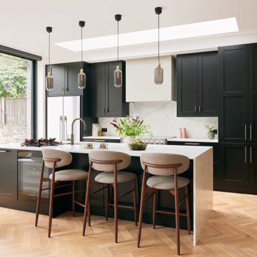 Black Shaker Kitchen with Silver Accents