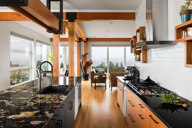 Example of a beach style kitchen design in Other