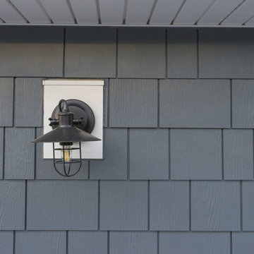 Exterior remodeling in Naperville with siding replacement and porch build out