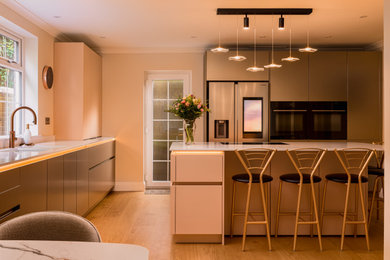 This is an example of a medium sized contemporary kitchen in Sussex.