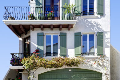 Inspiration for a mid-sized mediterranean two-story exterior home remodel in Los Angeles