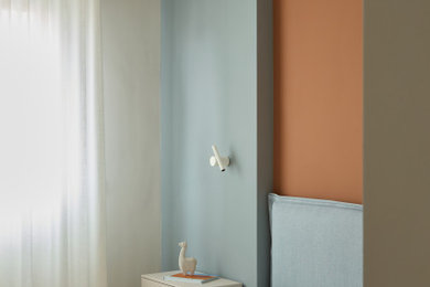 Bedroom - large contemporary master dark wood floor bedroom idea in Milan with blue walls