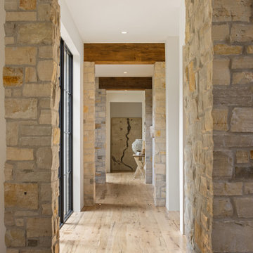 Weathered Antique Box Beams and White Oak Flooring in Rustic Modern Luxury Hall