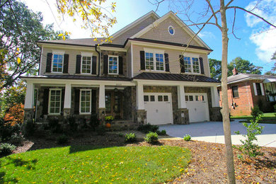 Inspiration for a large craftsman beige two-story mixed siding house exterior remodel in Raleigh
