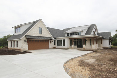 Country white two-story mixed siding house exterior idea in Austin
