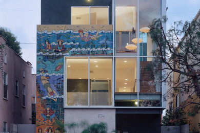Inspiration for a modern two-story exterior home remodel in Los Angeles