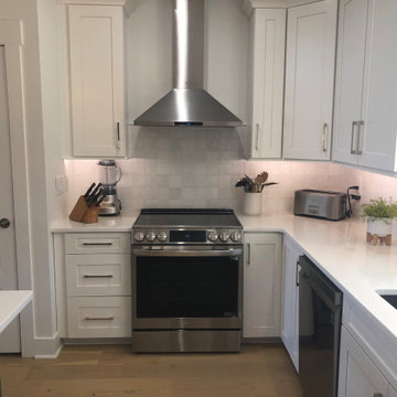 Custom Kitchen Range Nook with Stainless Hood & Tile Backsplash