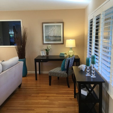 AFTER removing dining table and replaced office desk and comfortable quit seatin