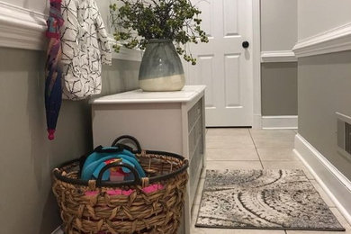 Small minimalist ceramic tile and multicolored floor mudroom photo in Richmond with multicolored walls