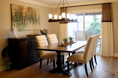 Dining room - mid-sized contemporary medium tone wood floor dining room idea in Orange County with gray walls