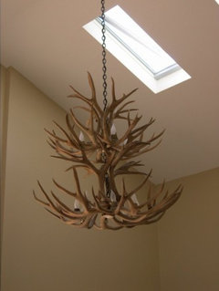 Two antler chandeliers in a home too much of a good thing