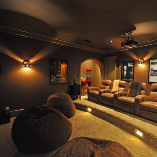 Example of a mountain style beige floor home theater design in Charleston