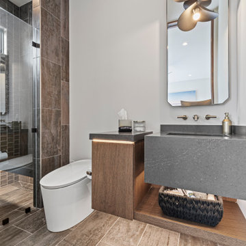 Modern Luxury Lakehouse Guest Bathroom with Floating Vanity and Textured Tile Sh