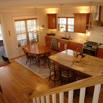 One wall kitchen with island, opening to screen porch
