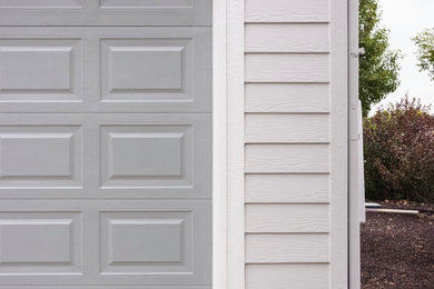 Example of a trendy garage design in Denver