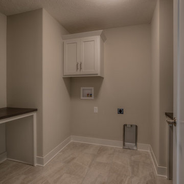 Custom Newport w/ side-load garage and master w/ sitting room