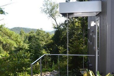 Minimalist gray two-story exterior home photo in Other