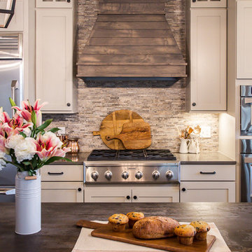Rustic Chic kitchen with barn wood vent hood