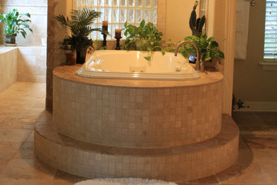 Large master ceramic tile drop-in bathtub photo in Houston with a one-piece toilet