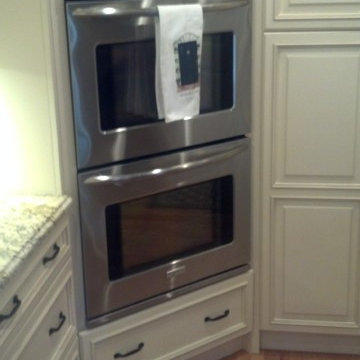 Rockville Centre Ivory Kitchen with Merlot Island