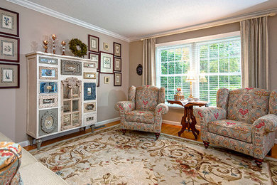 Example of a mid-sized classic formal and enclosed medium tone wood floor living room design in Other with gray walls, no fireplace and no tv