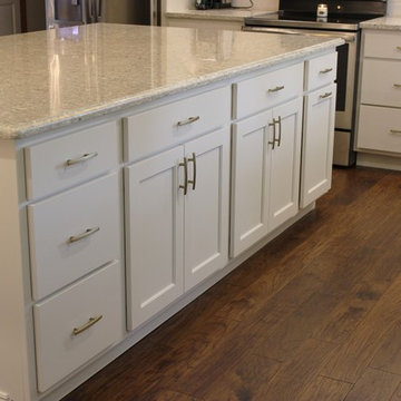 Davenport, IA- White Painted Kitchen With Gold Accents and Large Island