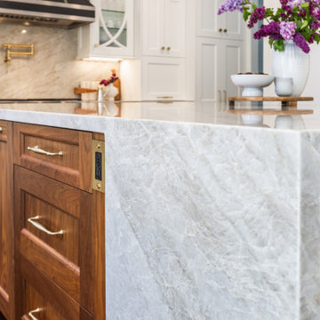 Marble Waterfall Edge with Custom Wood Island Cabinetry