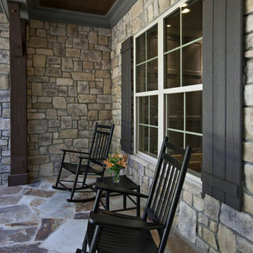 Stone porch and wood shutters