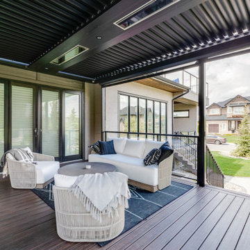 Adjustable StruXure Pergola Featuring Outdoor Kitchen With Screens & Heaters