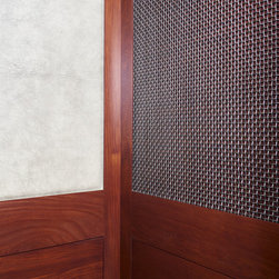 Raised Panel, Wire Mesh & Leather Hide Elevator - Products